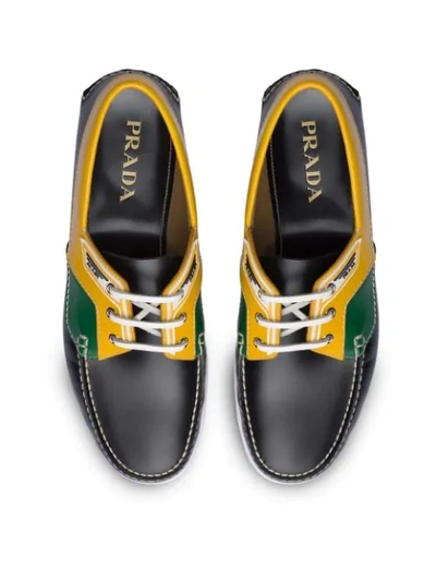 Shop Prada Brushed Leather Boat Shoes In Black ,yellow