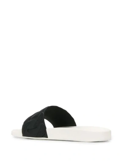 Shop Versace Textured Flip Flops In White