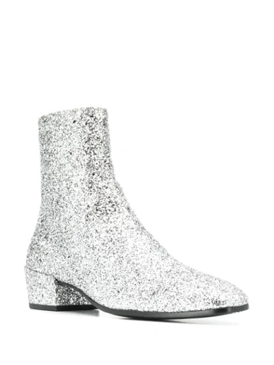 Shop Saint Laurent Glitter-effect Ankle Boots