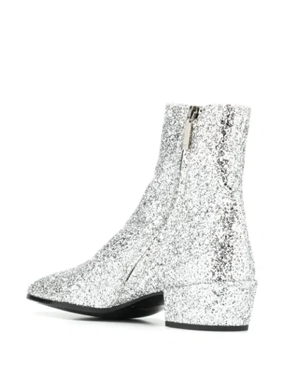 Shop Saint Laurent Glitter-effect Ankle Boots