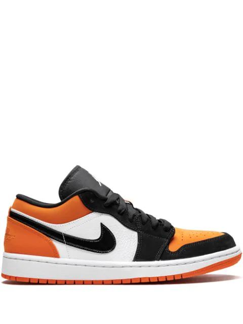 black and orange jordan 1 low