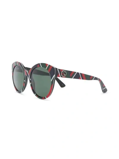 Shop Gucci Geometric Print Sunglasses In 绿色