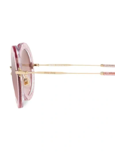 Shop Miu Miu Noir Sunglasses In Pink