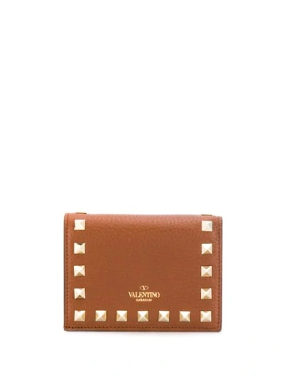 Shop Valentino Rockstud Wallet In Brown