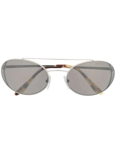 Shop Prada Oval Frame Sunglasses In Silver