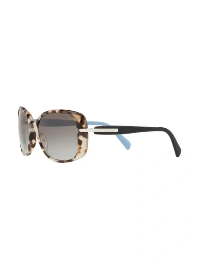Shop Prada Oversized Shaped Sunglasses In Braun
