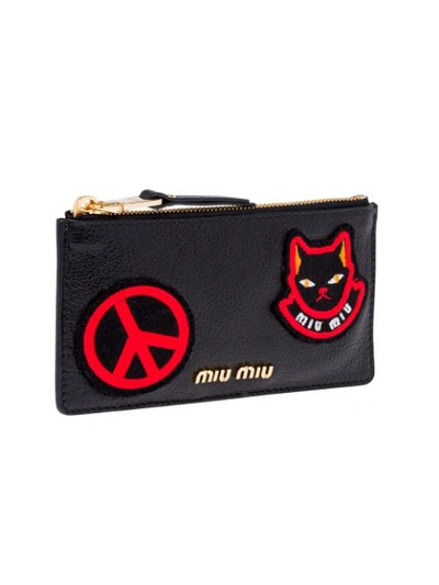 Shop Miu Miu Patch-appliquéd Zipped Pouch - Black