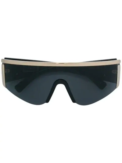 Shop Versace Tinted Visor Sunglasses In 1000/87