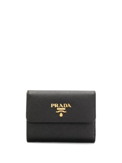 Shop Prada Saffiano Tri-fold Wallet In Black