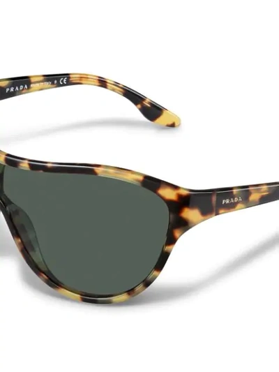Shop Prada Tortoiseshell Sunglasses In Brown