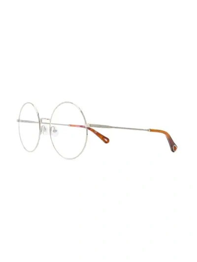 Shop Chloé Round Frame Glasses In Metallic