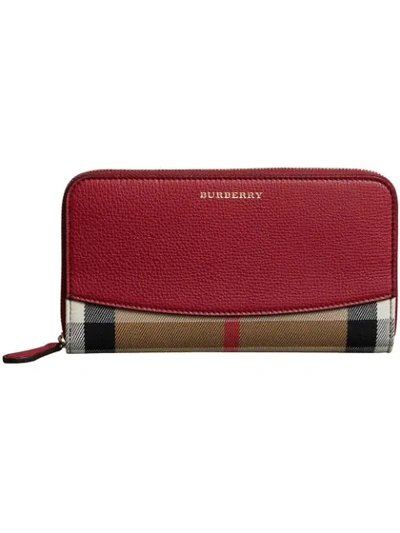 Shop Burberry House Check And Leather Ziparound Wallet - Red