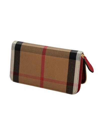 Shop Burberry House Check And Leather Ziparound Wallet - Red