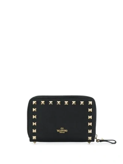 Shop Valentino Rockstud Zip-around Wallet In Black