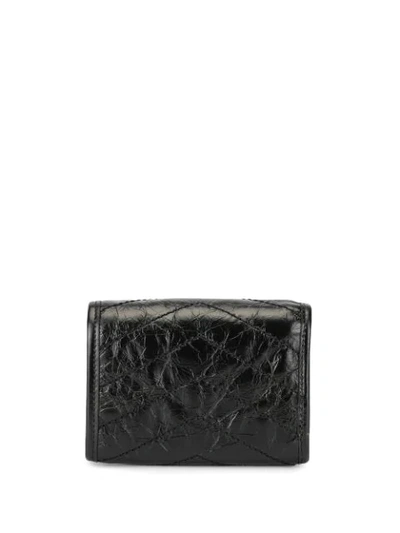 Shop Saint Laurent Niki Bi-fold Crinkled Wallet In Black