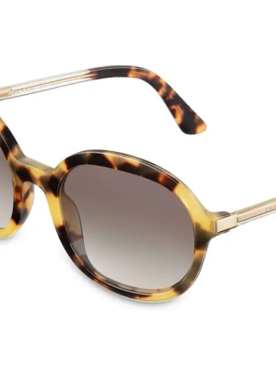Shop Prada Oversized Sunglasses In Brown