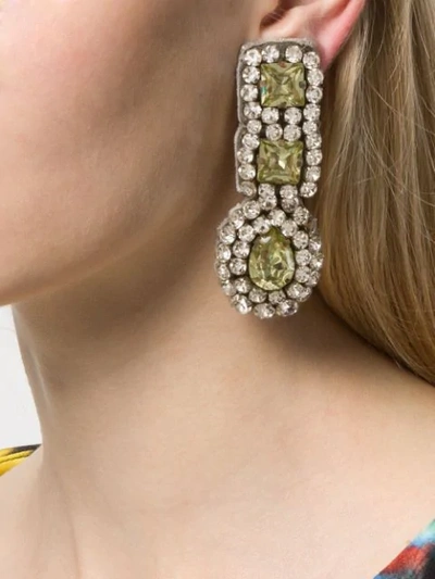 Shop Moschino Crystal Embellished Earrings In Yellow