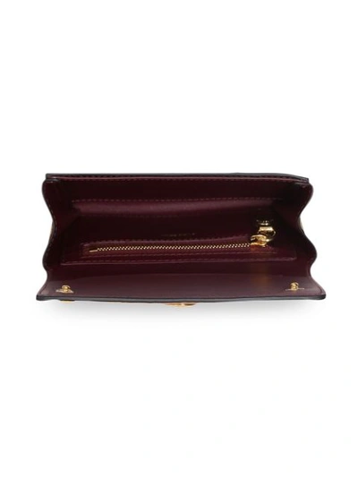 Shop Burberry Triple Stud Leather Folding Wallet In Brown