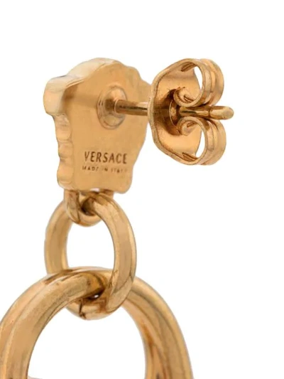 Shop Versace Crystal Embellished Safety Pin Earrings In Gold