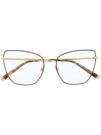 Shop Dolce & Gabbana Cat Eye Wire Glasses In Gold