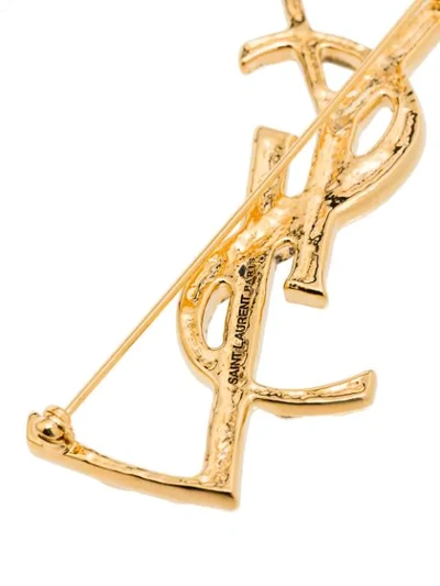 Shop Saint Laurent Ysl Pin Brooch In Gold