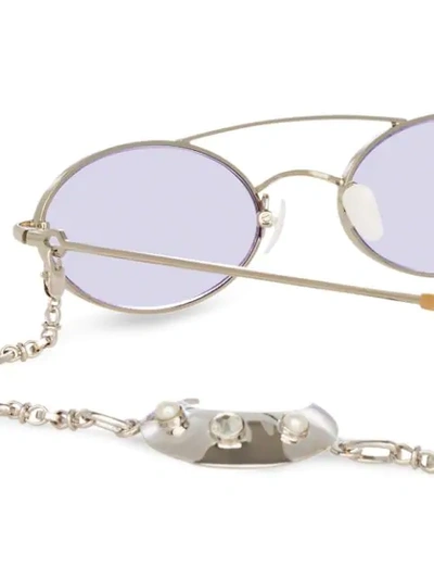 Shop Linda Farrow Oval Frame Sunglasses In Silver
