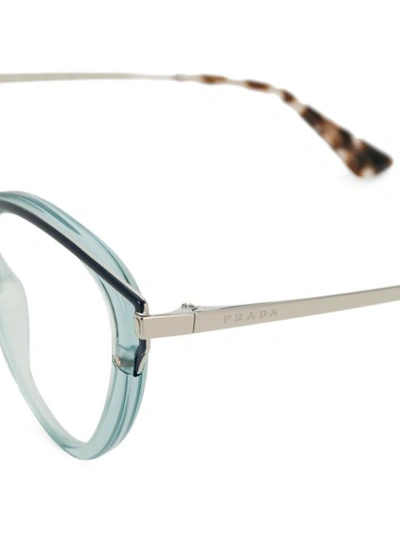 Shop Prada Eyewear Cat Eye-frame Glasses - Blue