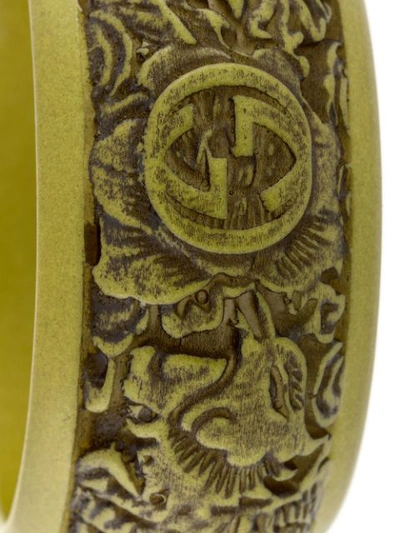 Shop Gucci Logo Carved Bracelet In Green