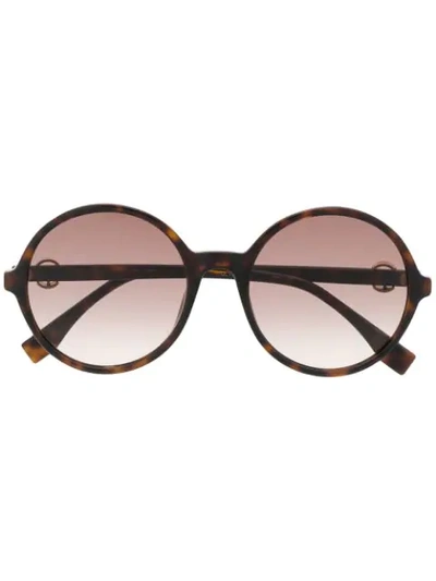 Shop Fendi Round Frame Sunglasses In Brown