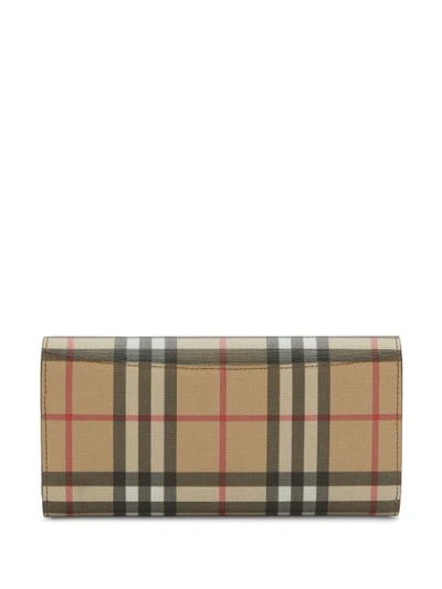Shop Burberry Vintage Check E-canvas Continental Wallet In Brown