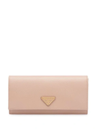 Shop Prada Saffiano Logo Wallet In Pink