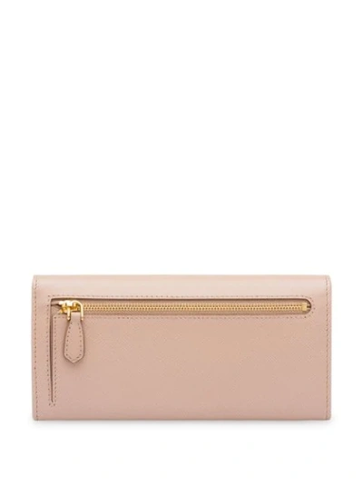 Shop Prada Saffiano Logo Wallet In Pink