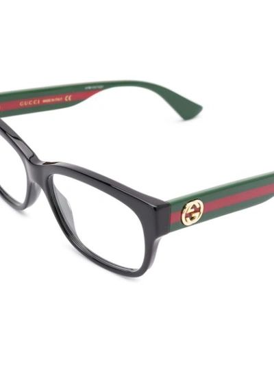 Shop Gucci Rectangular Frame Glasses In Black