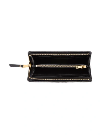 Shop Miu Miu Matelassé Zip-around Wallet In Black