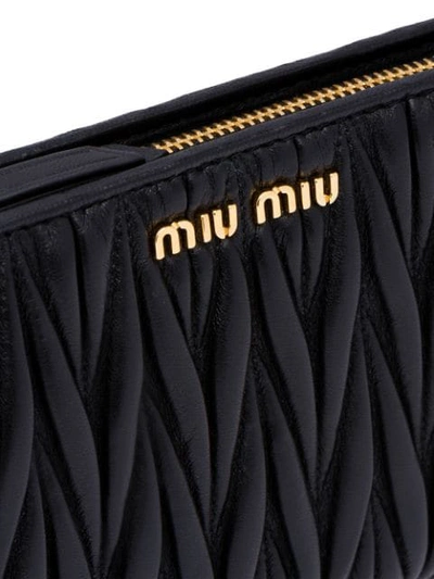 Shop Miu Miu Matelassé Zip-around Wallet In Black