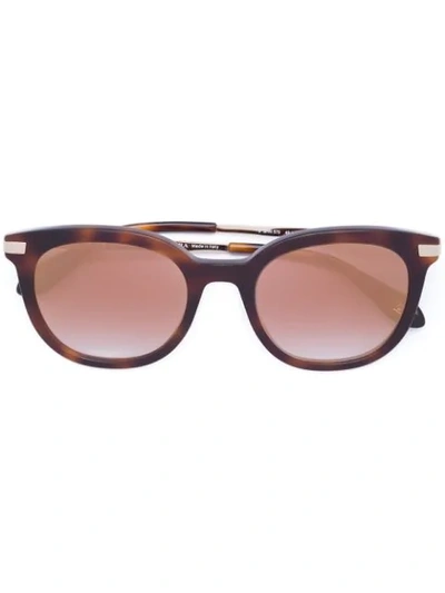 Shop Carolina Herrera Mirrored Lense Sunglasses - Brown