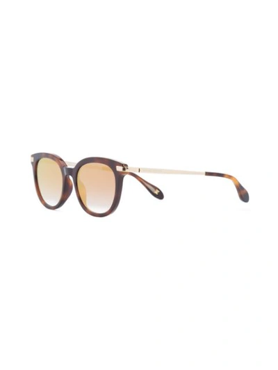 Shop Carolina Herrera Mirrored Lense Sunglasses - Brown