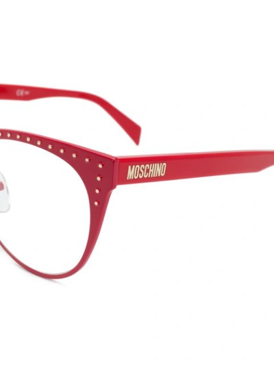 Shop Moschino Eyewear Cat Eye Frame Glasses - Red