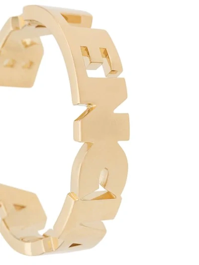 Shop Balenciaga Logo Lettering Cuff In Gold