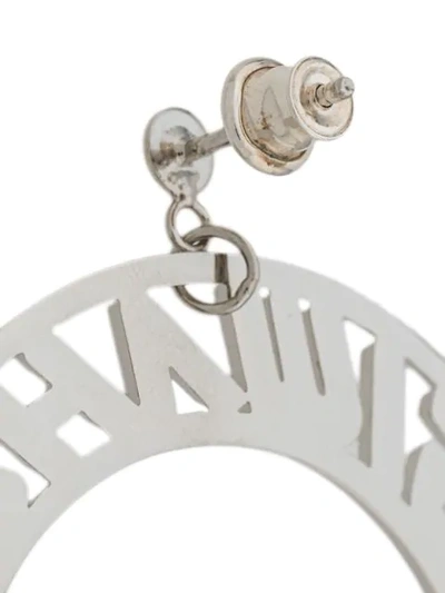 Shop Misbhv Logo Hoop Earrings In Metallic