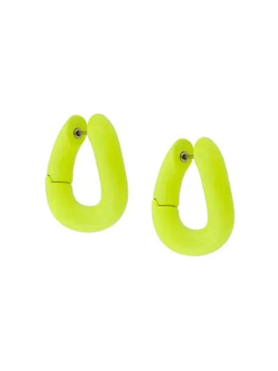 Shop Balenciaga Loop Earrings In Yellow