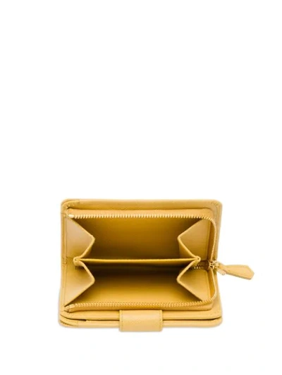 Shop Prada Saffiano Wallet In Yellow