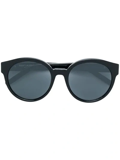 Shop Saint Laurent Round Frame Sunglasses In Black