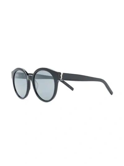 Shop Saint Laurent Round Frame Sunglasses In Black