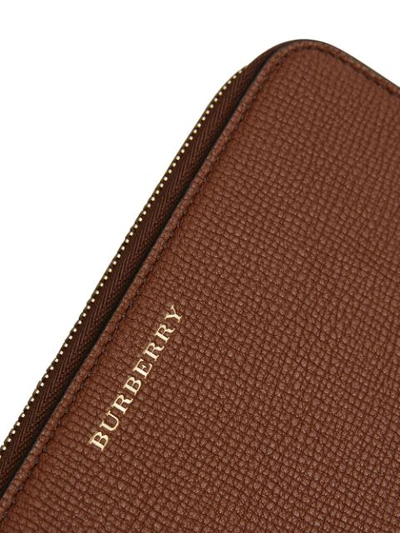 Shop Burberry House Check And Leather Ziparound Wallet - Brown