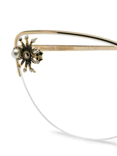 Shop Alexander Mcqueen Spider Appliqué Cat Eye Glasses In Gold