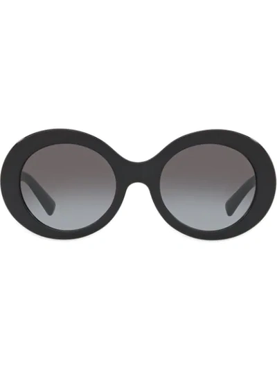 Shop Valentino Oversized Round Frame Sunglasses In Black