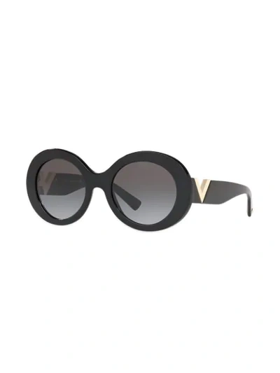 Shop Valentino Oversized Round Frame Sunglasses In Black