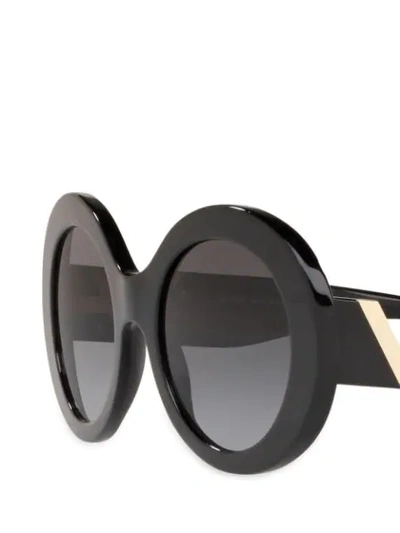 Shop Valentino Oversized Round Frame Sunglasses In Black