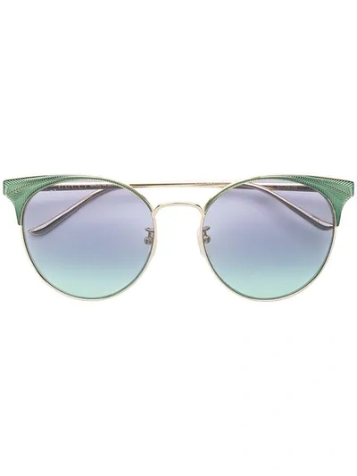 Shop Gucci Oversized Cat Eye Sunglasses In Gold
